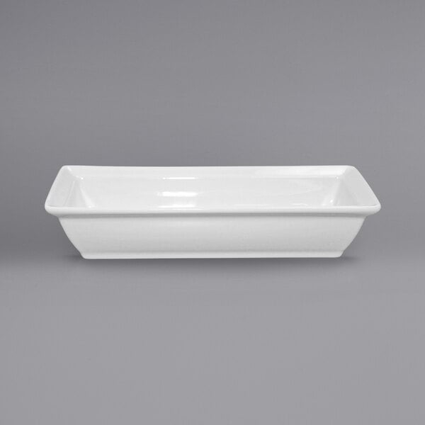 A white rectangular International Tableware porcelain bowl.