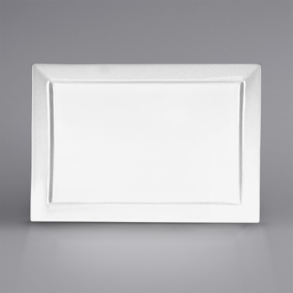 A white rectangular porcelain platter with a black border.