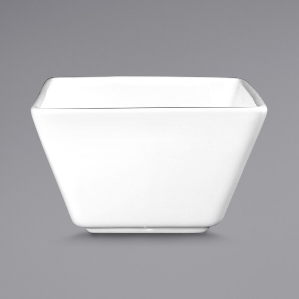 An International Tableware bright white square porcelain fruit dish.