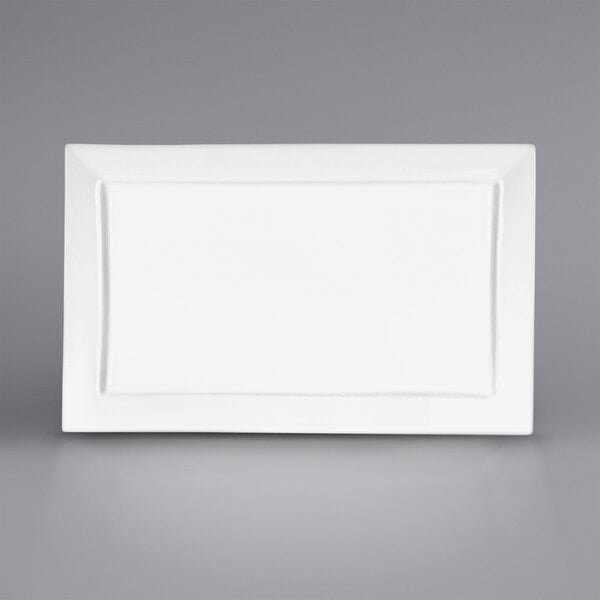 A white rectangular porcelain platter with a black border.