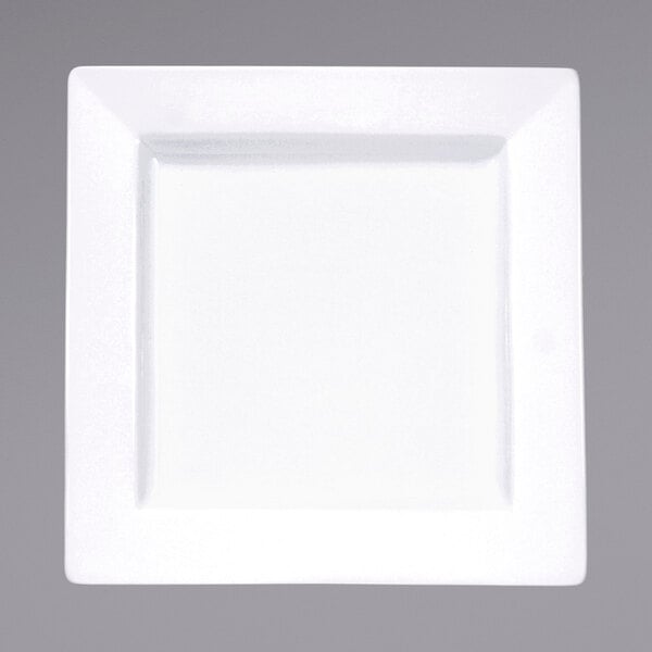 An International Tableware bright white square porcelain plate with a square edge and white rim.