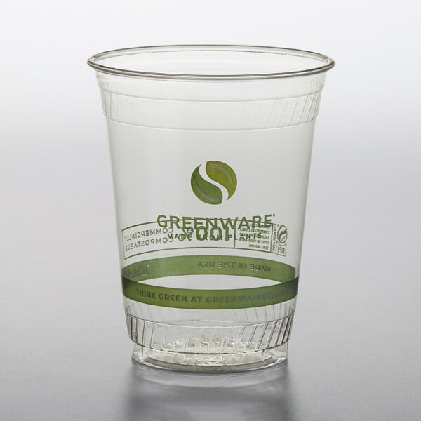 A clear plastic Fabri-Kal Greenware cup with a green logo.