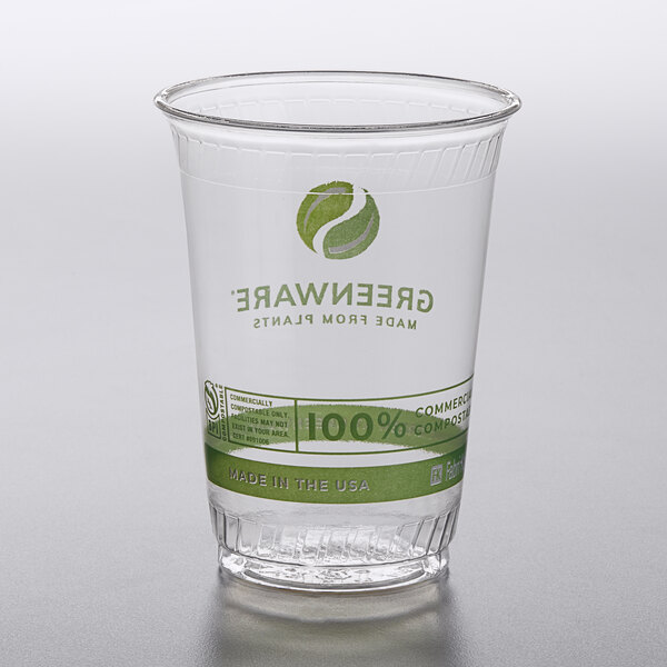 A clear plastic Fabri-Kal Greenware cup with a green logo.