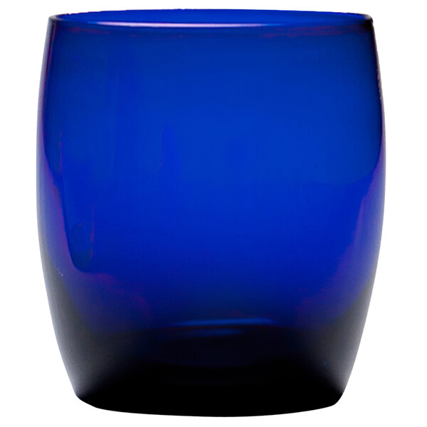 A Fortessa cobalt blue short beverage glass on a white background.