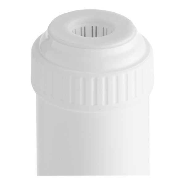 A close-up view of a white cylindrical cartridge with a ridged cap and a central opening featuring vertical slits.