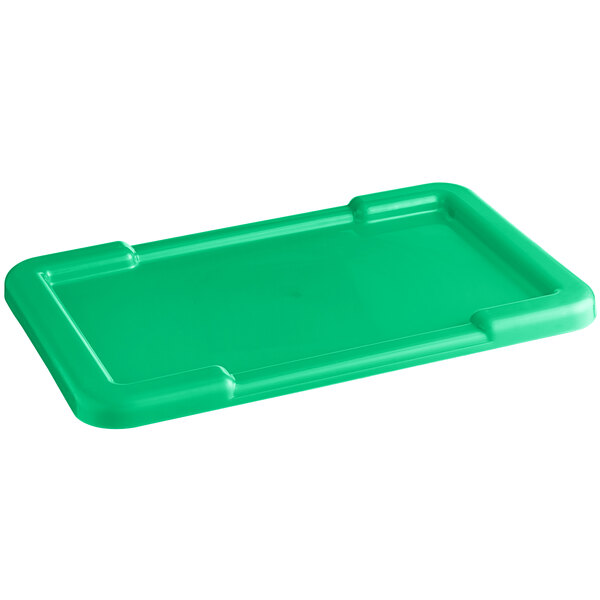 A green plastic tray with a recessed lid.