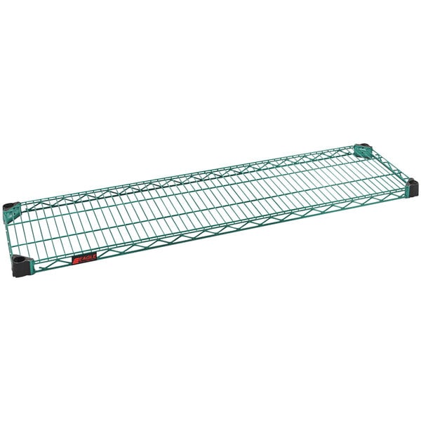 a green wire rack on a white background