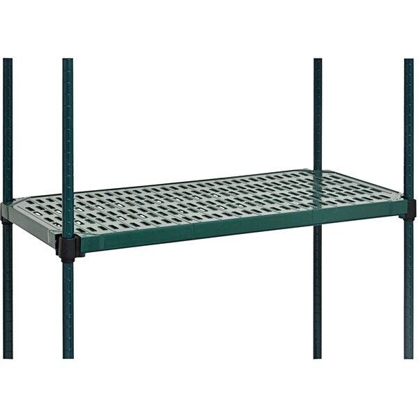 A green metal shelf with green louvered mats.