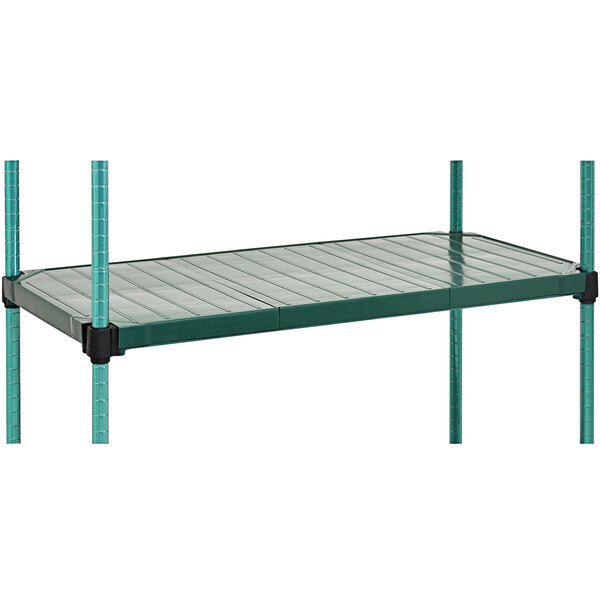 An Eagle Group green metal shelving unit with a QuadPLUS solid polymer mat.