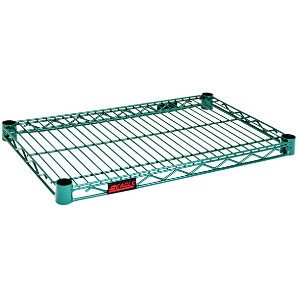 a green metal shelf with a red label