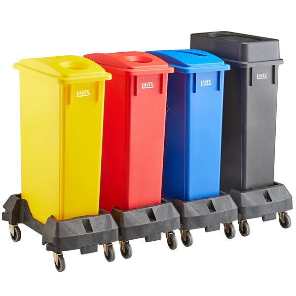 A group of Lavex rectangular recycle stations with black, blue, red, and yellow lids.