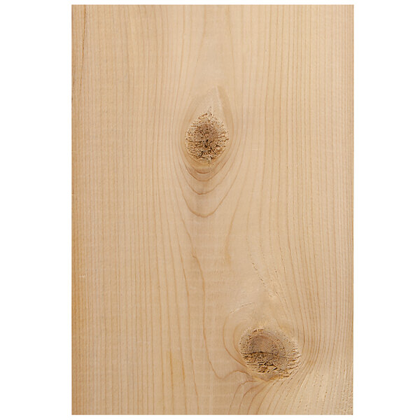 A close-up of cedar wood with a grain pattern.