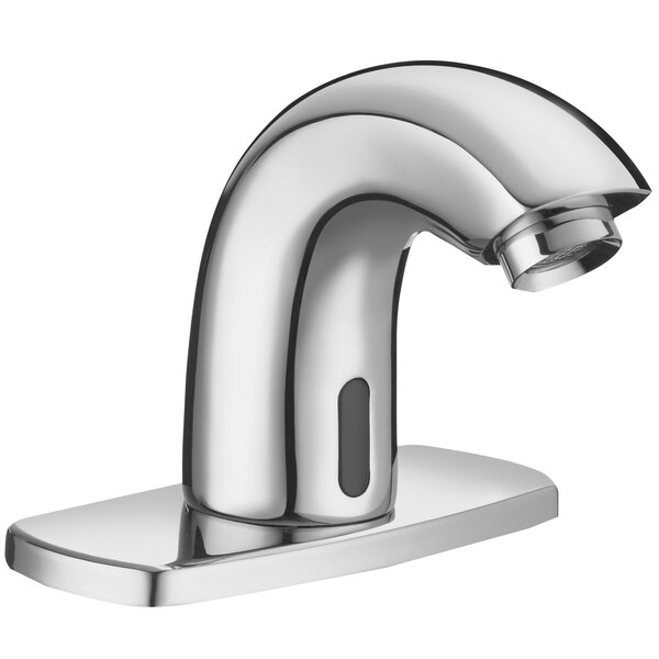 a silver faucet with a button