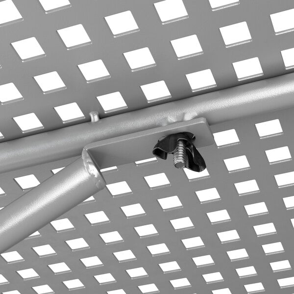 a metal structure with a screw