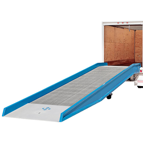 A blue Bluff Manufacturing steel yard ramp attached to a truck.
