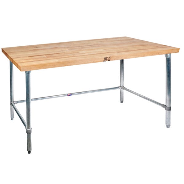 A John Boos wooden work table with a galvanized metal base.