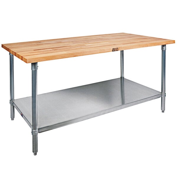 A John Boos wood top work table with a stainless steel base and adjustable undershelf.