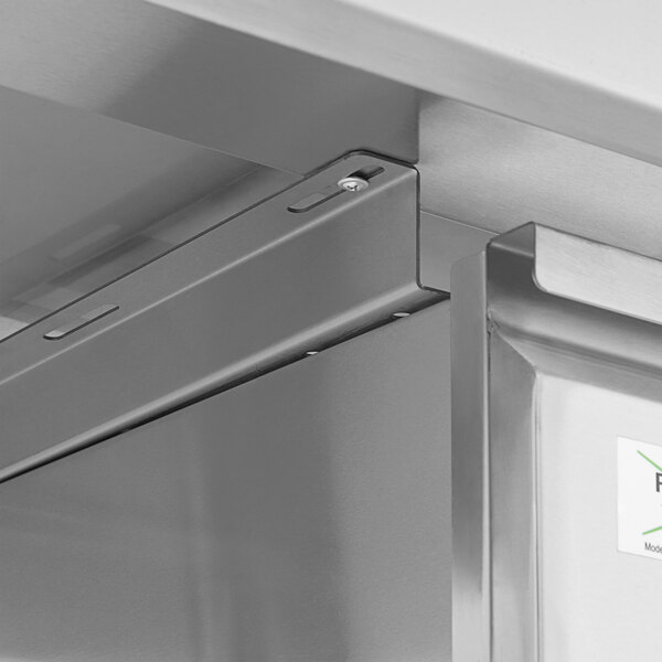 A Regency stainless steel triple-stacked drawer set with a metal surface.