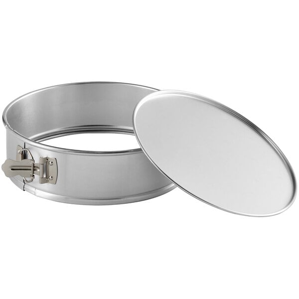 A natural finish aluminum springform cake pan.