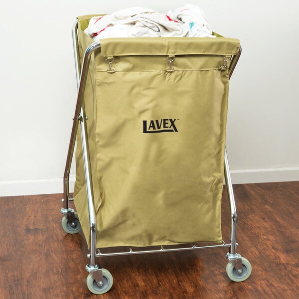 A yellow canvas laundry bag on a metal frame.