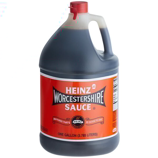 A jug of Heinz Worcestershire Sauce with a red label and handle.