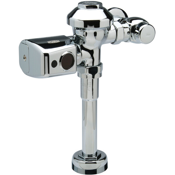 A close-up of a chrome plated Zurn urinal flush valve.