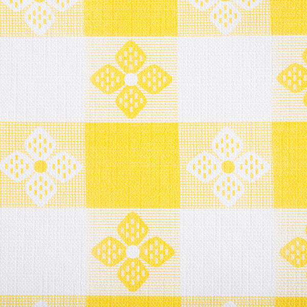 A yellow and white checkered tablecloth with a flannel back.
