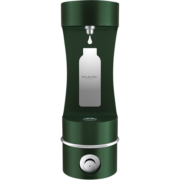 An Elkay green and silver outdoor wall mount bottle filling station with a green bottle of liquid being filled.