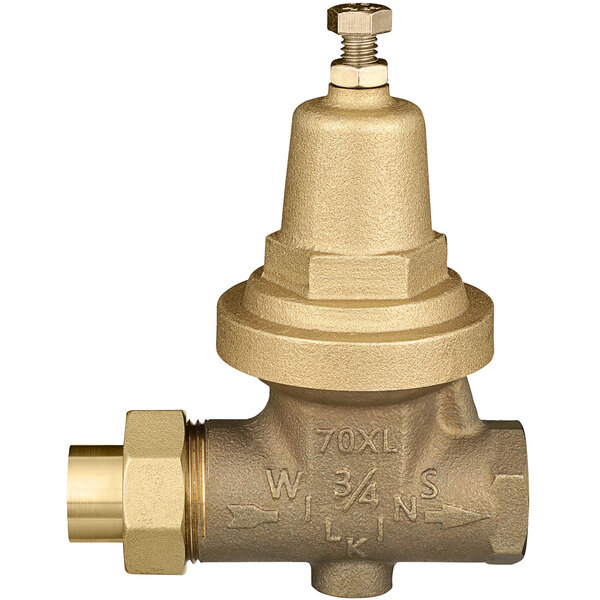 A close-up of a Zurn brass water pressure reducing valve with a copper connection.