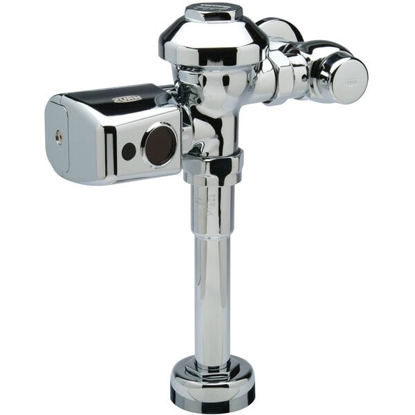 A close-up of a Zurn chrome-plated urinal flush valve.