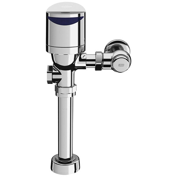 A close-up of a chrome Zurn dual flush valve for a toilet.