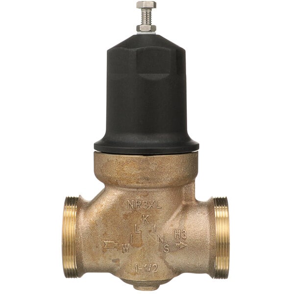 A close-up of a Zurn brass water valve with a black cap.