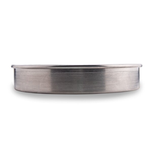 An American Metalcraft aluminum cake pan with straight sides.