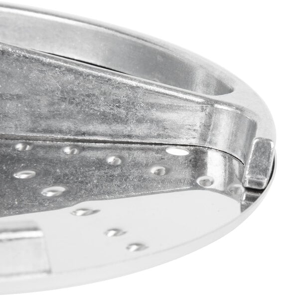 A Robot Coupe 1/16" metal grating / shredding disc with holes.