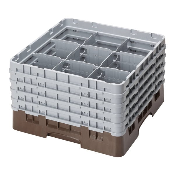 A brown plastic Camrack with 9 compartments and 5 extenders.