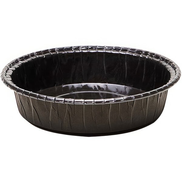 A black paper baking mold with a round bottom.