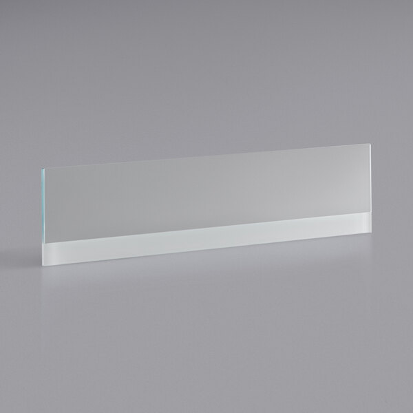 A clear rectangular glass shelf with a white border.