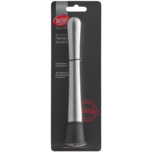 A Tablecraft brushed stainless steel muddler with a black handle.