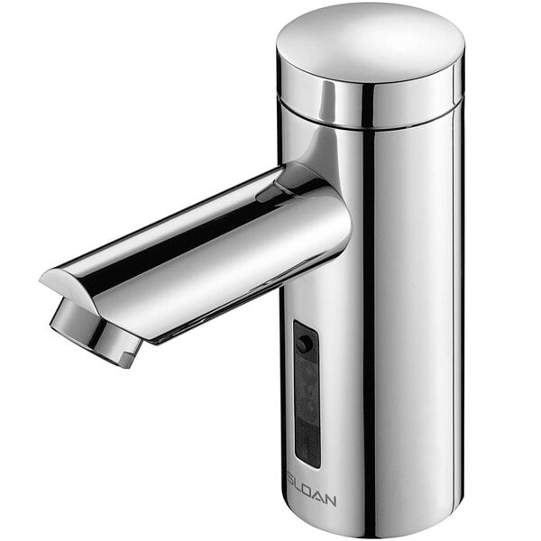 A close-up of a Sloan Optima Bluetooth chrome sensor faucet with a button.
