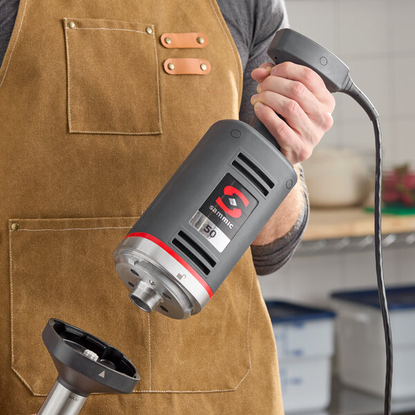 A Sammic XM-51 heavy-duty 16-inch variable speed immersion blender with a 1 HP motor.