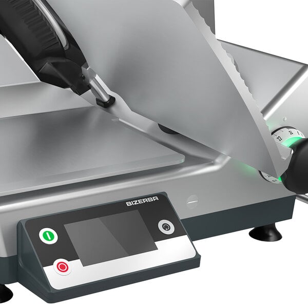 A Bizerba automatic meat slicer on a counter with a circular blade and a green screen.