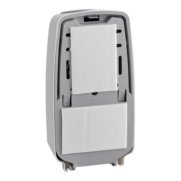 A white touch-free automatic foam hand soap or sanitizer dispenser with a 33.8 fl. oz. (1000 mL) capacity.