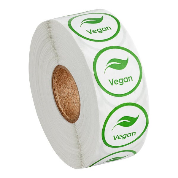 A roll of round green labels with the word 'Vegan' and a leaf symbol, containing 1,000 labels.