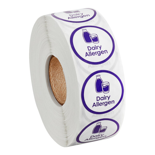 A roll of white paper with blue and purple Point Plus Dairy Allergen labels.