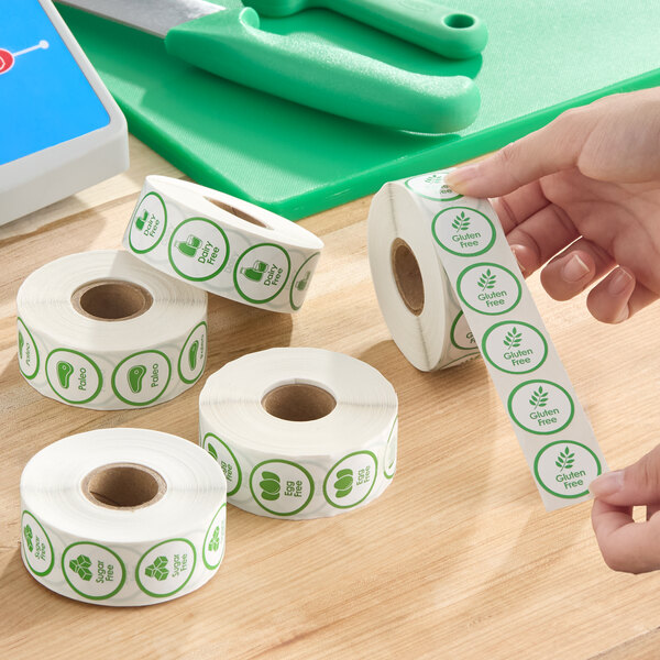 A roll of green 'Egg Free' permanent labels, each measuring 1 inch, with 1,000 labels per roll.