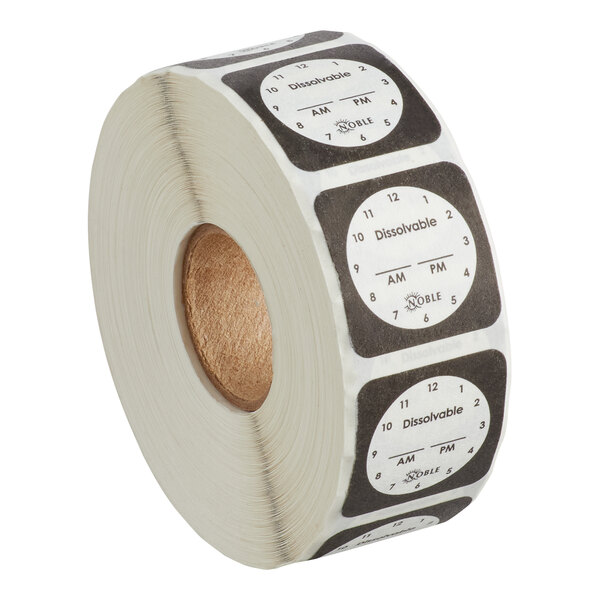 A roll of Noble Products 1-inch dissolvable clock labels, containing 1,000 labels per roll.