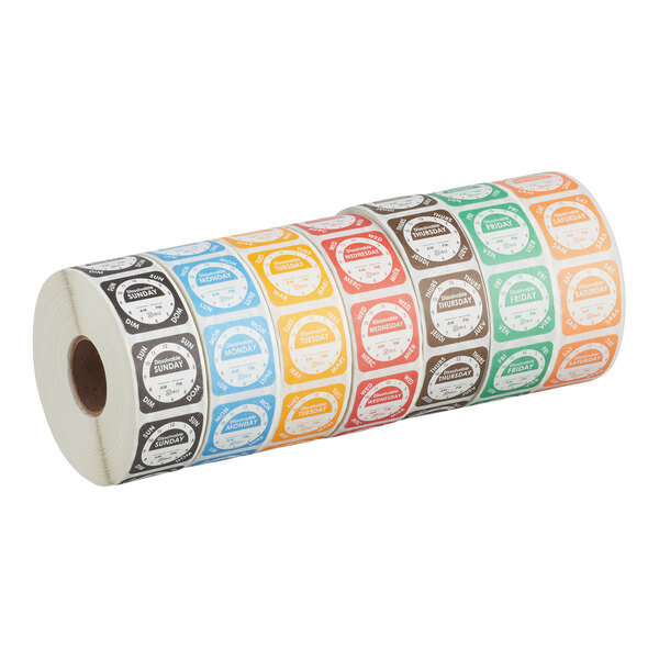 A roll of Noble Products 1-inch dissolvable day of the week clock labels in assorted colors.