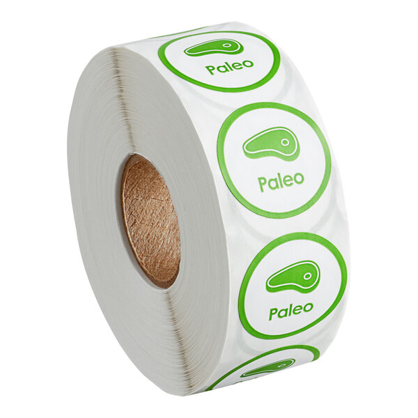 A roll of Point Plus green Paleo labels with the word "Paleo" on them.