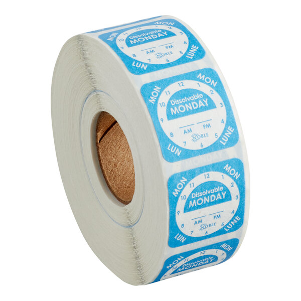 A roll of dissolvable Monday day of the week clock labels.