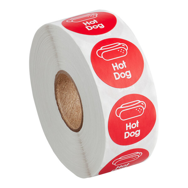A roll of Point Plus hot dog labels with a red and white label.